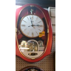 OkaeYa Oval Shaped Red Musical Pendulum Wall Clock Beautiful Design